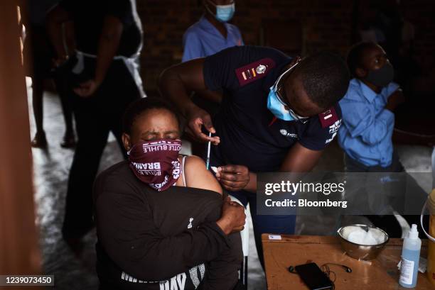 Health worker administers a Covid-19 vaccine to a staff member during a rural vaccination drive by BroadReach Group, the public health implementation...