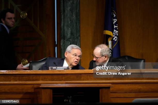 Committee chairman Sen. Bob Menendez confers with ranking member Sen. James Risch during a Senate Foreign Relations Committee hearing on Capitol Hill...