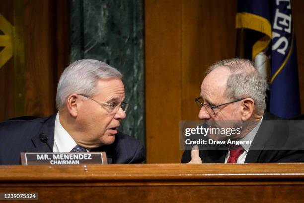 Committee chairman Sen. Bob Menendez confers with ranking member Sen. James Risch during a Senate Foreign Relations Committee hearing on Capitol Hill...