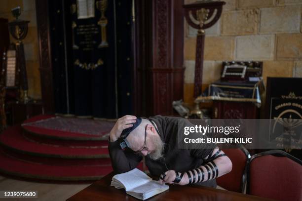 Jewish faithful prays in the Chabad Synagogue in Odessa on March 9 14 days after Russia launched a military invasion on Ukraine. - Forced yet again...