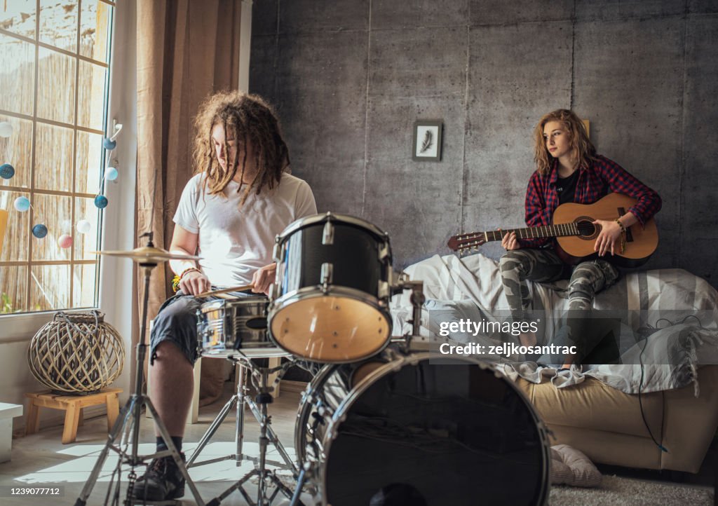 Playimg Rocks Teenager Playing Rock And Roll At Home High-Res Stock Photo - Getty Images