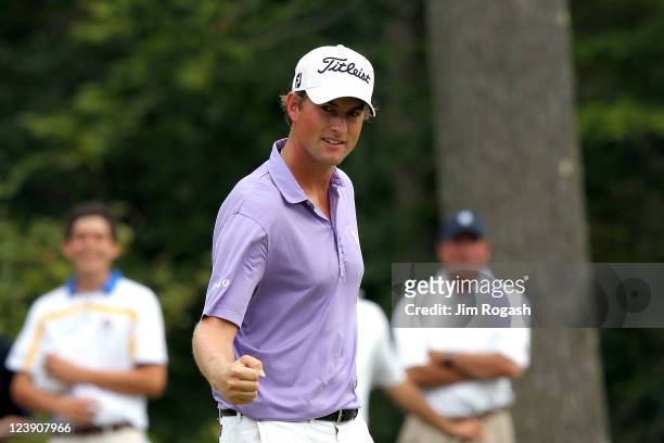 Webb Simpson reacts after he made an eagle on the seventh hole during the final round of the Deutsche Bank Championship at TPC Boston on September 5,...