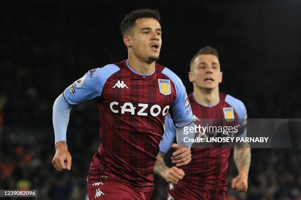 Aston Villa's Brazilian midfielder Philippe Coutinho celebrates after scoring the opening goal of the English Premier League football match between...