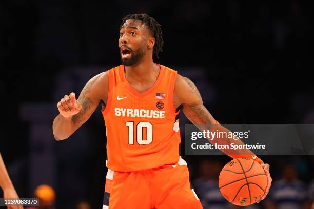 Syracuse Orange guard Symir Torrence controls the ball during the second half of the ACC Tournament quarterfinal college basketball game between the...