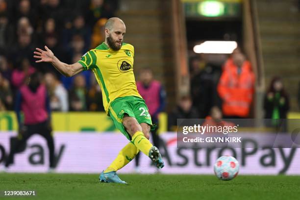 Norwich City's Finnish striker Teemu Pukki shoots a penalty kick and scores his team first goal during the English Premier League football match...