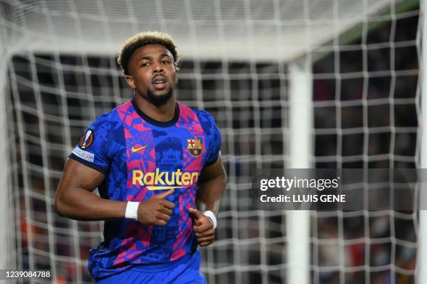 Barcelona's Spanish forward Adama Traore leaves the pitch during the UEFA Europa League round of 16 first leg football match between FC Barcelona and...