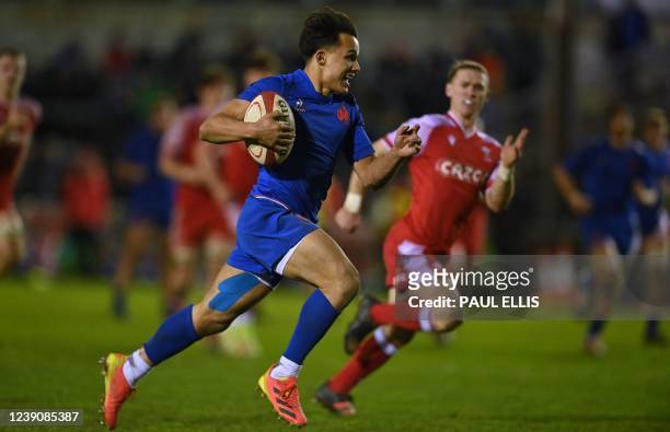 France U20's wing Enzo Reybier runs in a try during the U20 Six Nations international rugby union match between Wales and France at Stadiwm Zip...