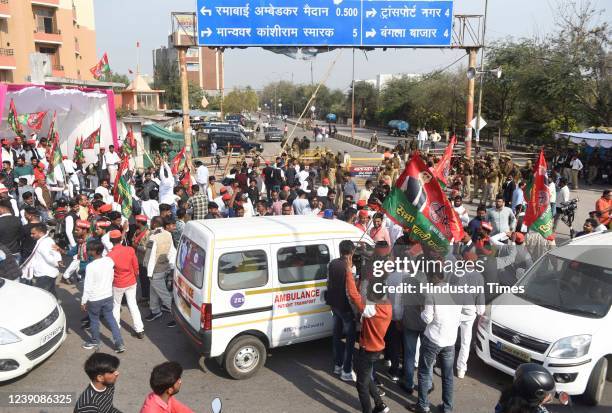 Samajwadi Party supporters stop an ambulance to check outside Ramabai Ambedkar Counting centre on March 10, 2022 in Lucknow, India. The Bharatiya...