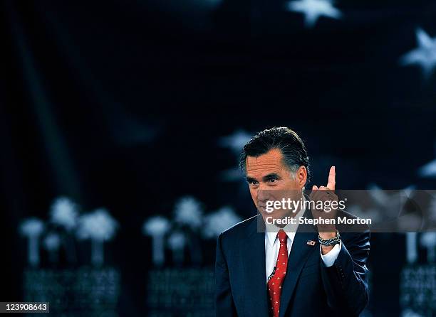 Presidential candidate and former Massachusetts Governor Mitt Romney gestures as he answers a question during the American Principles Project...