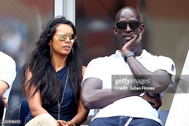 Kevin Garnett of the Boston Celtics and his wife Brandi attend Day Eight of the 2011 US Open at the USTA Billie Jean King National Tennis Center on...