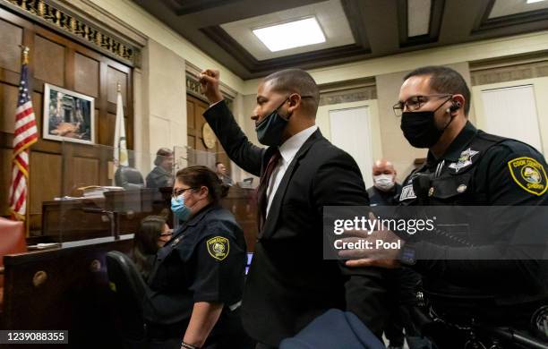 Actor Jussie Smollett is led out of the courtroom after being sentenced at the Leighton Criminal Court Building on March 10, 2022 in Chicago,...