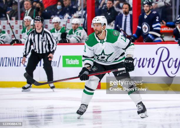 Luke Glendening of the Dallas Stars keeps an eye on the play during second period action against the Winnipeg Jets at Canada Life Centre on March 04,...