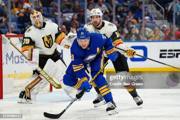 Laurent Brossoit and Nicolas Hague of the Vegas Golden Knights defend against Kyle Okposo of the Buffalo Sabres during an NHL game on March 10, 2022...