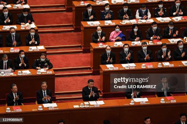 China's leaders and delegates, including Politburo Standing Committee member Zhao Leji, Politburo Standing Committee member Wang Yang, China's...