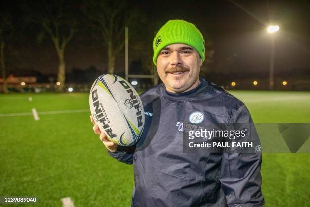 Richie Fagan member of the Emerald Warriors rugby team poses for pictures as he takes part in a weekly training session at the Rathcar high school in...