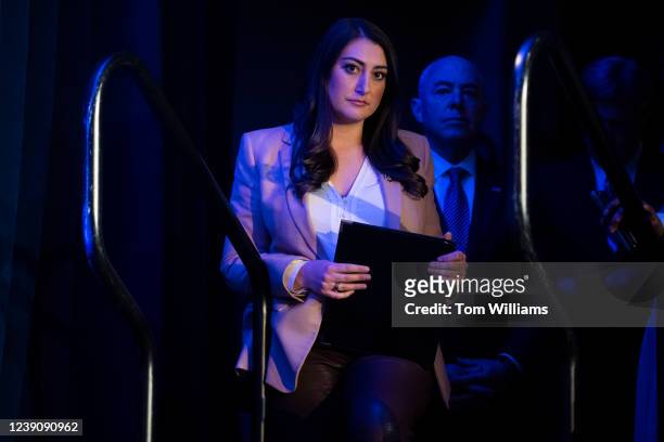 Rep. Sara Jacobs, D-Calif., prepares to moderate a discussion with Alejandro Mayorkas, background, secretary of the Department of Homeland Security,...