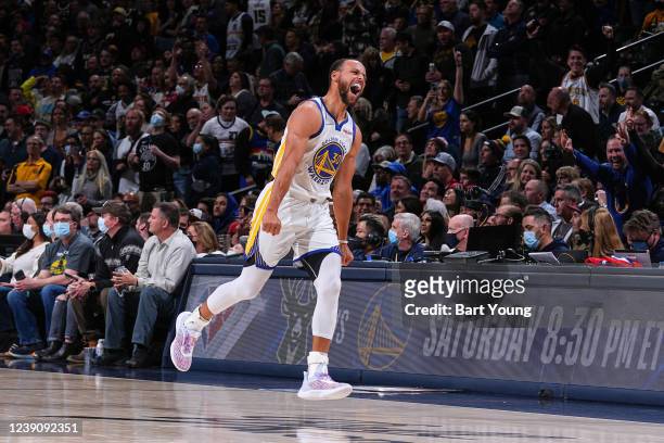Stephen Curry of the Golden State Warriors celebrates during the game against the Denver Nuggets on March 10, 2022 at the Ball Arena in Denver,...