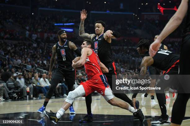 Washington Wizards guard Raul Neto tries to get past LA Clippers forward Marcus Morris Sr. And Amir Coffey in the first half during the Washington...