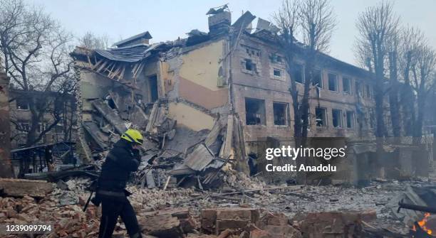 Firefighters are seen at the site after airstrikes hit civil settlements as Russian attacks continue on Ukraine in Dnipro, Ukraine on March 11, 2022.