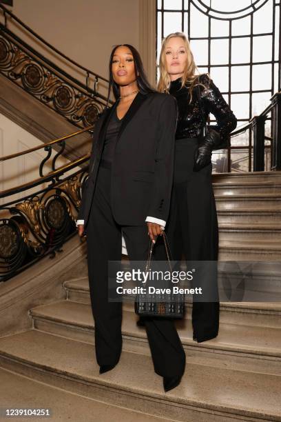 Naomi Campbell and Kate Moss attend the Burberry Autumn/Winter 2022 Runway Show, the brand's first live runway for over 2 years, at Central Hall...