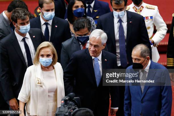 Outgoing President of Chile Sebastian Piñera leaves the National Congress with outgoing First Lady Cecilia Morel after the presidential inauguration...