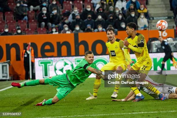 Goalkeeper Rafal Gikiewicz of FC Augsburg controls the ball during the Bundesliga match between FC Augsburg and Borussia Dortmund at WWK-Arena on...