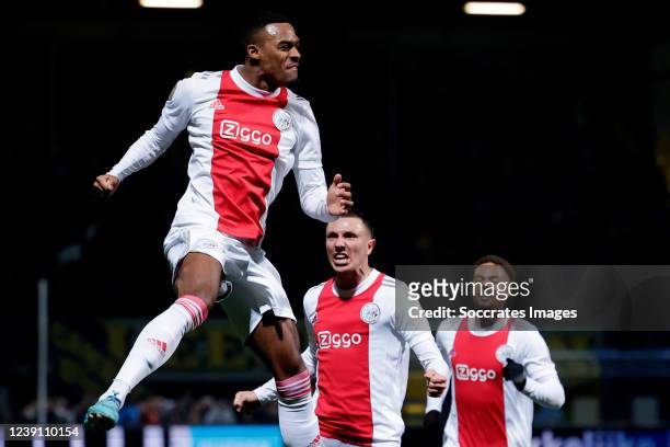 Ryan Gravenberch of Ajax celebrates his 2-3 with Devyne Rensch of Ajax, Steven Berghuis of Ajax during the Dutch Eredivisie match between SC Cambuur...