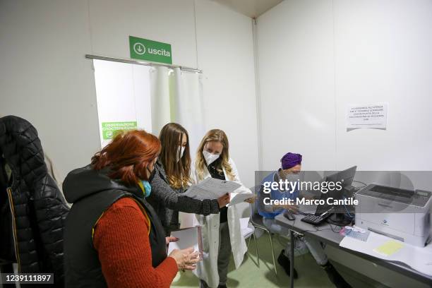 Ukrainian refugees, fleeing their country invaded by Russians, in the vaccination health center of Naples, to get swabs and vaccination against...