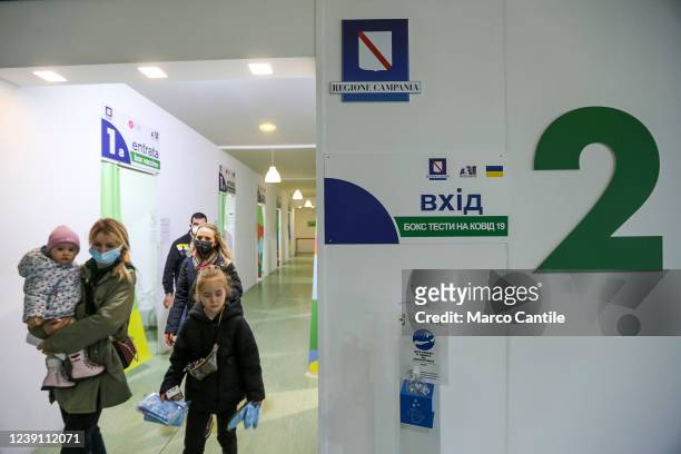 Ukrainian refugees, fleeing their country invaded by Russians, in the vaccination health center of Naples, to get swabs and vaccination against...