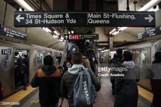 People are seen during rush hour at a subway platform as daily life in New York City, United States on March 11, 2022.