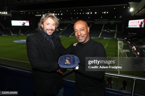 Former West Bromwich Albion player Diego Lugano is presented with his West Bromwich Albion players cap by former player Brendon Batson ahead of the...