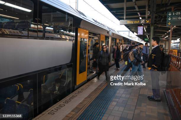 Commuters alight the train at Central station on June 01, 2020 in Sydney, Australia. Restrictions continue to ease around Australia in response to...