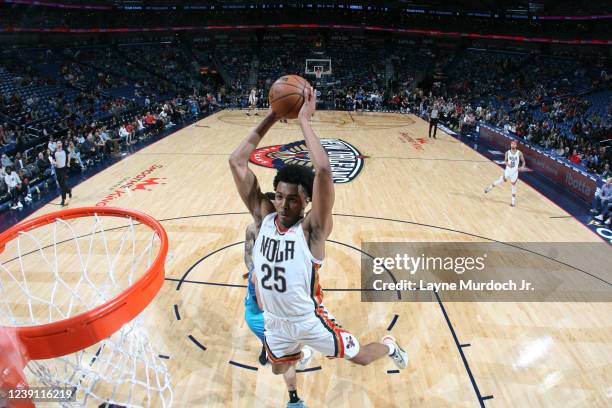 Trey Murphy III of the New Orleans Pelicans dunks the ball during the game against the Charlotte Hornets on March 11, 2022 at the Smoothie King...