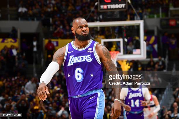 LeBron James of the Los Angeles Lakers reacts to a play during the game against the Washington Wizards on March 11, 2022 at Crypto.Com Arena in Los...