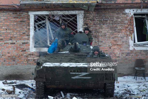 Pro-Russian separatists prepare to drive a tank in the pro-Russian separatists-controlled Donetsk, Ukraine on March 11, 2022. Troops patrolled the...