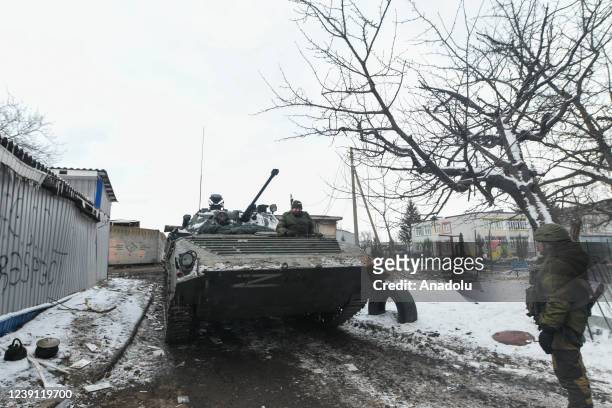 Members of pro-Russian separatists are seen in the pro-Russian separatists-controlled Donetsk, Ukraine on March 11, 2022. Troops patrolled the areas...