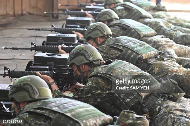 Taiwan's reservists take part in a military training at a military base in Taoyuan on March 12, 2022.