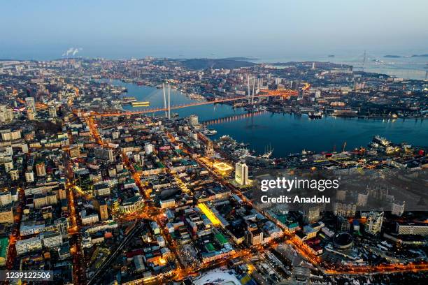 An aerial view shows city lights in Vladivostok, major Pacific port city in Russia overlooking Golden Horn Bay, near the borders with China and North...