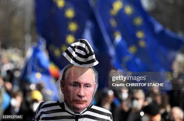 An effigy of Russian President Vladimir Putin in prison clothing is seen during a demonstration against Russia's war in Ukraine, in Munich, southern...