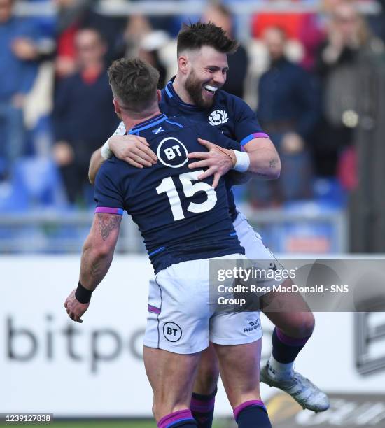 March 11: Scotland captain Stuart Hogg celebrates his try with teammate Ali Price during a Six Nations match between Italy and Scotland at the Stadio...