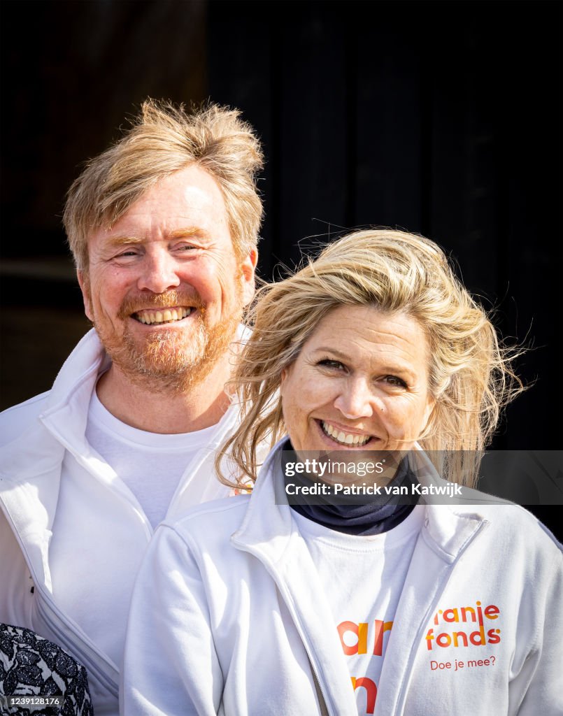 King Willem-Alexander Of The Netherlands And Queen Maxima Volunteers During The NLDoet In Brielle