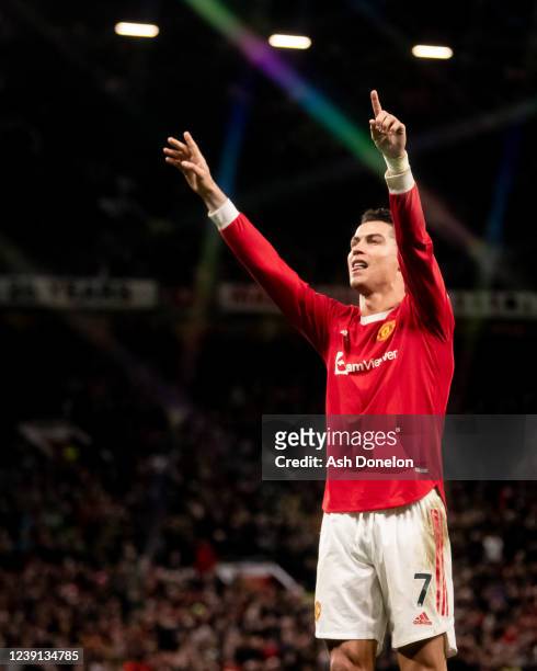 Cristiano Ronaldo of Manchester United celebrates scoring a goal to make the score 3-2 and secure his hat-trick during the Premier League match...
