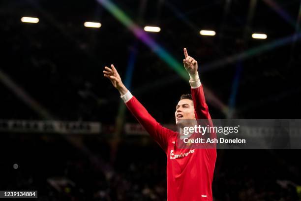 Cristiano Ronaldo of Manchester United celebrates scoring a goal to make the score 3-2 and secure his hat-trick during the Premier League match...