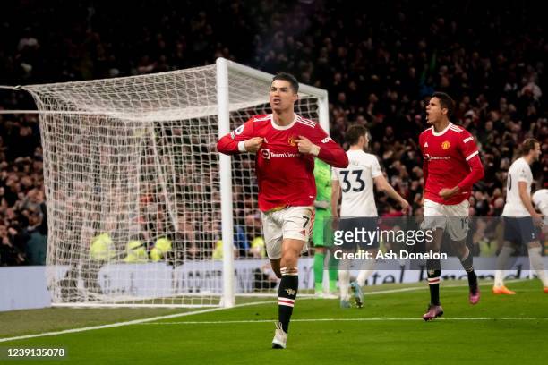 Cristiano Ronaldo of Manchester United celebrates scoring a goal to make the score 3-2 and secure his hat-trick during the Premier League match...
