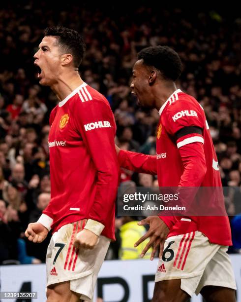 Cristiano Ronaldo of Manchester United celebrates scoring a goal to make the score 3-2 and secure his hat-trick during the Premier League match...