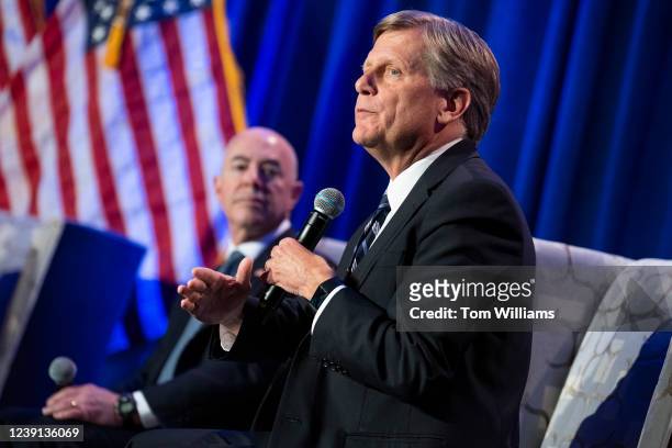 Michael McFaul, right, former U.S. Ambassador to Russia, and Alejandro Mayorkas, secretary of the Department of Homeland Security, participate in a...