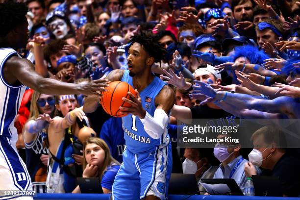 Cameron Crazies and fans of the Duke Blue Devils try to distract Leaky Black of the North Carolina Tar Heels at Cameron Indoor Stadium on March 5,...