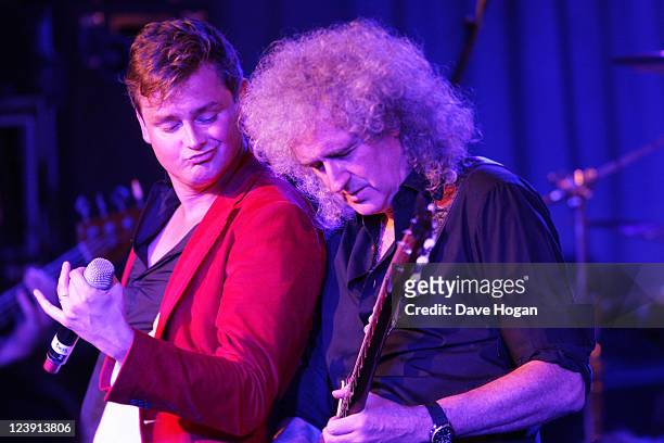 Tom Chaplin and Brian May perform onstage at the Freddie For A Day 65th birthday anniversary party at The Savoy Hotel on September 5, 2011 in London,...