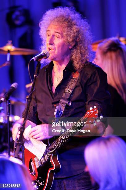Brian May performs at the Freddie For A Day 65th birthday anniversary party at The Savoy Hotel on September 5, 2011 in London, United Kingdom.