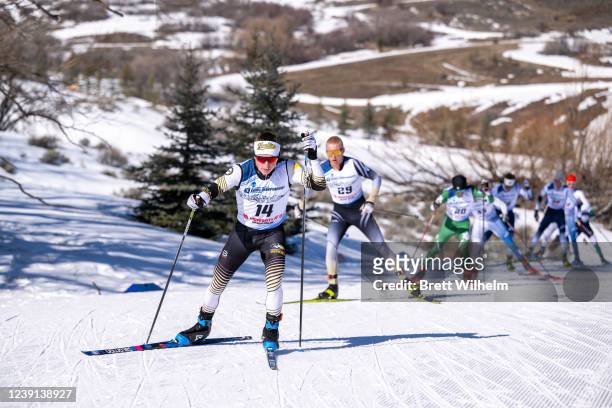 Colin Freed of the Michigan Tech Huskies competes in the Mens Freestyle Mass Start race during the Division I Mens and Womens Skiing Championships...
